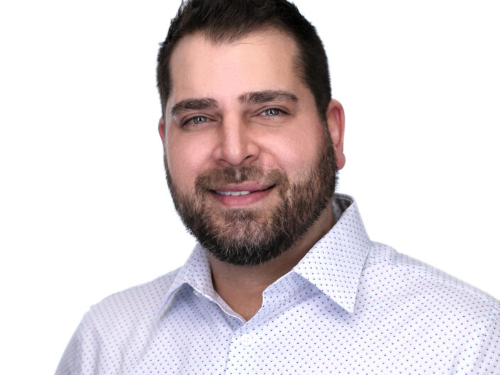 Headshot of guy in white shirt