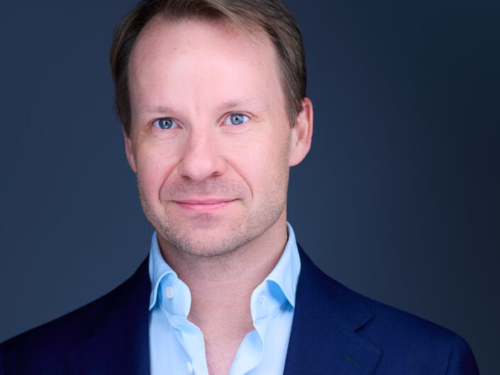 Professional ERAS headshot of President and Chief Operating Officer at Flynn Group by DeMayne Earvin of The Headshot Experience in Cleveland, Ohio